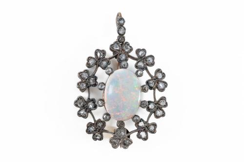 AN OPAL AND ROSE CUT DIAMOND PENDANT BROOCH