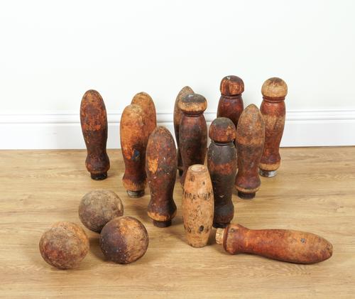 A SET OF WOODEN SKITTLES AND BALLS (17)