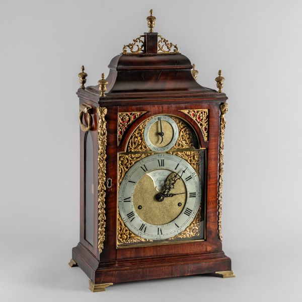 A GEORGE III BRASS-MOUNTED MAHOGANY STRIKING AND REPEATING VERGE BRACKET CLOCK WITH CALENDAR