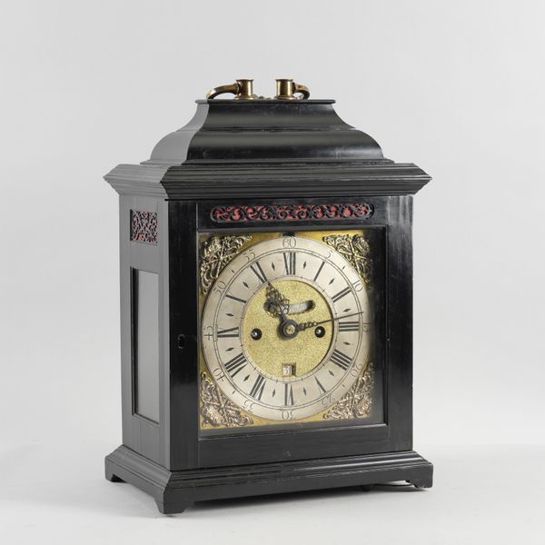 AN EBONISED QUARTER REPEATING AND STRIKING VERGE TABLE CLOCK