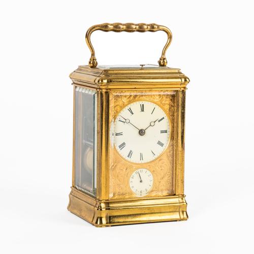 A FRENCH GILT BRASS GORGE CASED STRIKING AND REPEATING CARRIAGE CLOCK