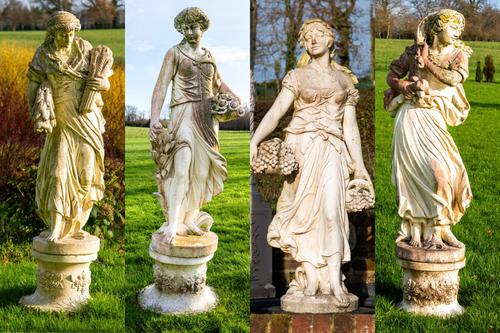 A SET OF FOUR RECONSTITUTED STONE FIGURES (4)