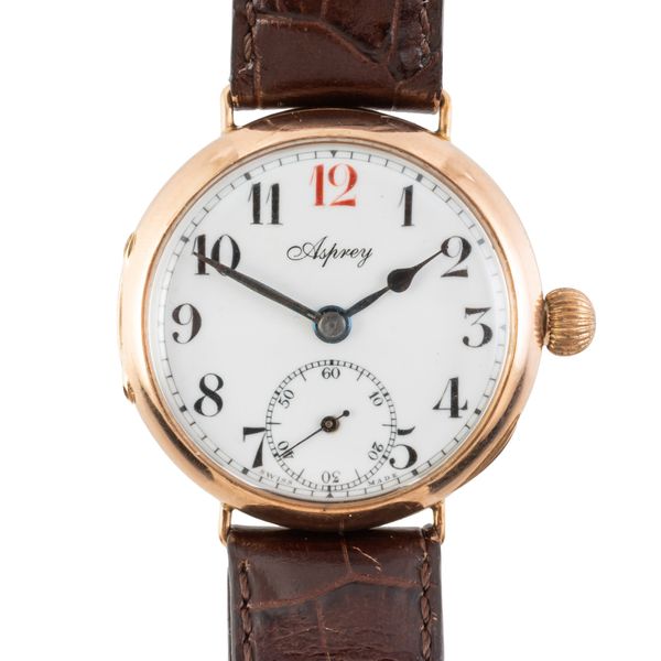 A 1913 ASPREYS 9CT GOLD WATCH