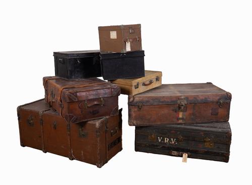 A GROUP OF EIGHT TRAVEL TRUNKS AND DOCUMENT BOXES (8)