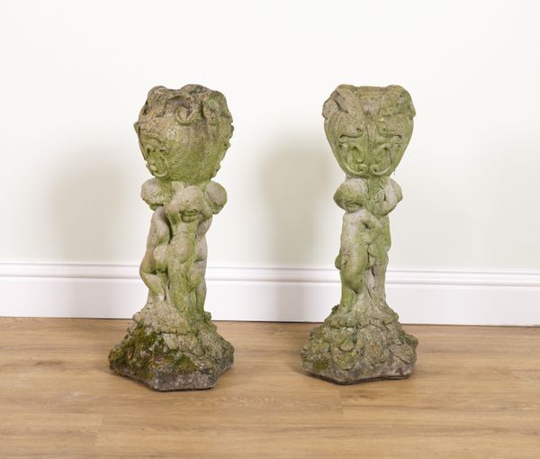 A PAIR RECONSTITUTED STONE GARDEN URNS (2)