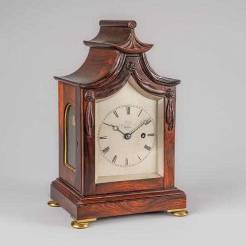AN EARLY VICTORIAN ROSEWOOD SMALL MANTEL TIMEPIECE