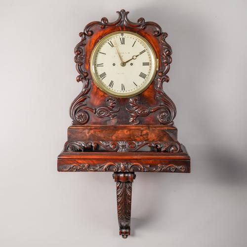 A LATE WILLIAM IV / EARLY VICTORIAN MAHOGANY BRACKET CLOCK AND BRACKET