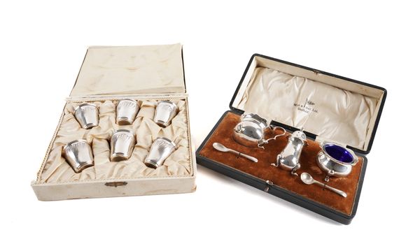 A SILVER CONDIMENT SET AND A FRENCH LIQUEUR SET (2)