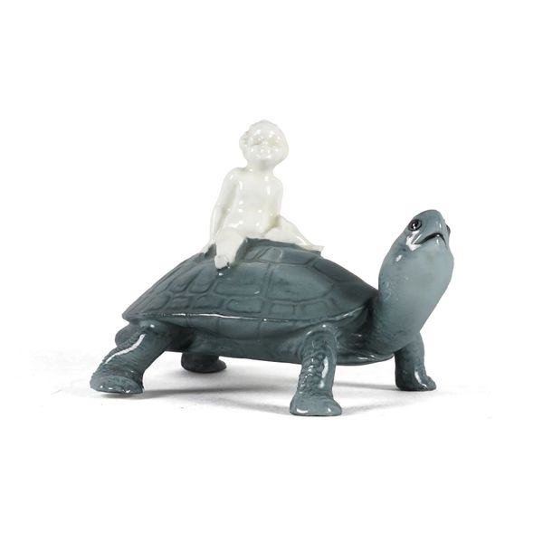 `BOY ON A TORTOISE'. A RARE ROYAL DOULTON PROTOTYPE FIGURE