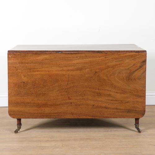 A REGENCY MAHOGANY DROP FLAP DINING TABLE