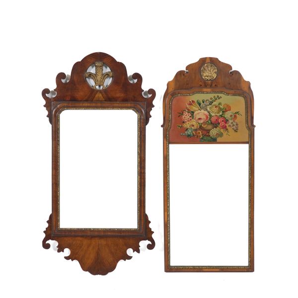 AN 18TH CENTURY PARCEL GILT FRET CARVED WALNUT PIER MIRROR (2)