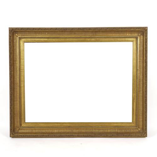 A GILT FRAMED RECTANGULAR WALL MIRROR