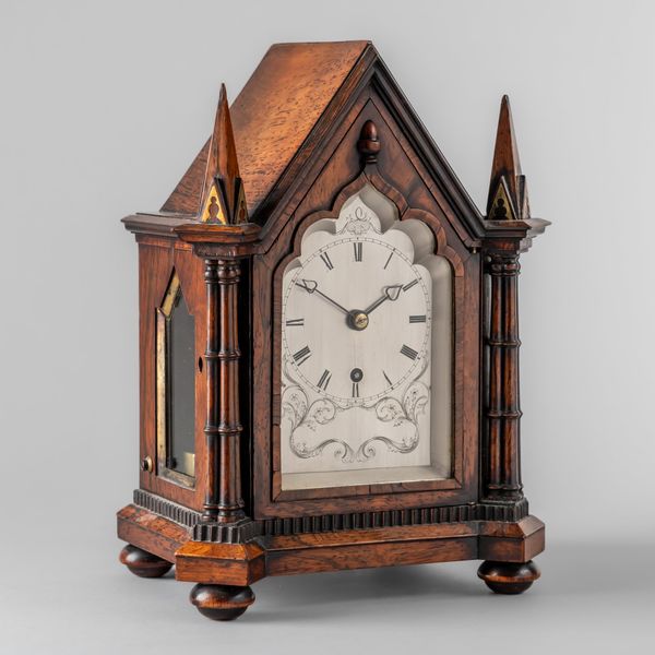 AN EARLY VICTORIAN AND BRASS-INLAID MANTEL TIMEPIECE