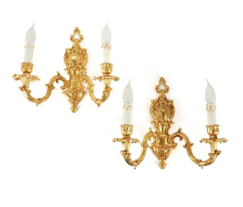 A PAIR OF ITALIAN ROCOCO STYLE GILT-METAL TWIN LIGHT WALL APPLIQUES (2)