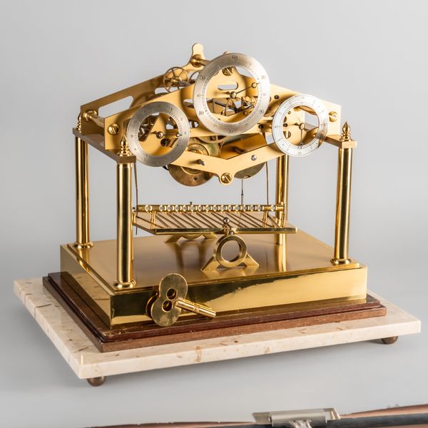 A CONGREVE ROLLING BALL CLOCK