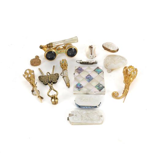 THREE GILT-BRASS MOUNTED POSY-HOLDER BROOCHES (QTY)