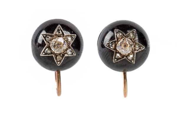 A PAIR OF CARBUNCLE GARNET AND DIAMOND EARRINGS (2)