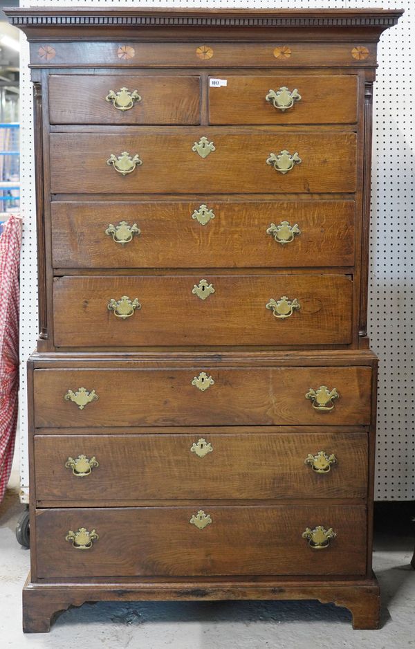 A GEORGE III INLAID OAK EIGHT DRAWER CHEST ON CHEST