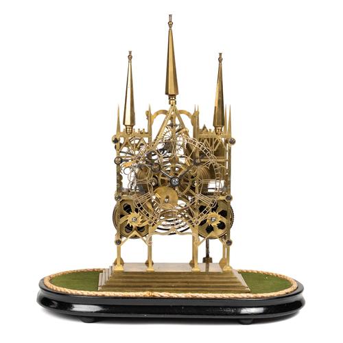 AN UNUSUAL VICTORIAN BRASS STRIKING SKELETON CLOCK