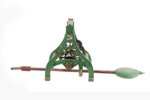 A GREEN-PAINTED CAST-IRON TURRET TIMEPIECE