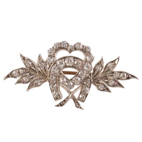 A HEART AND HORSESHOE BROOCH