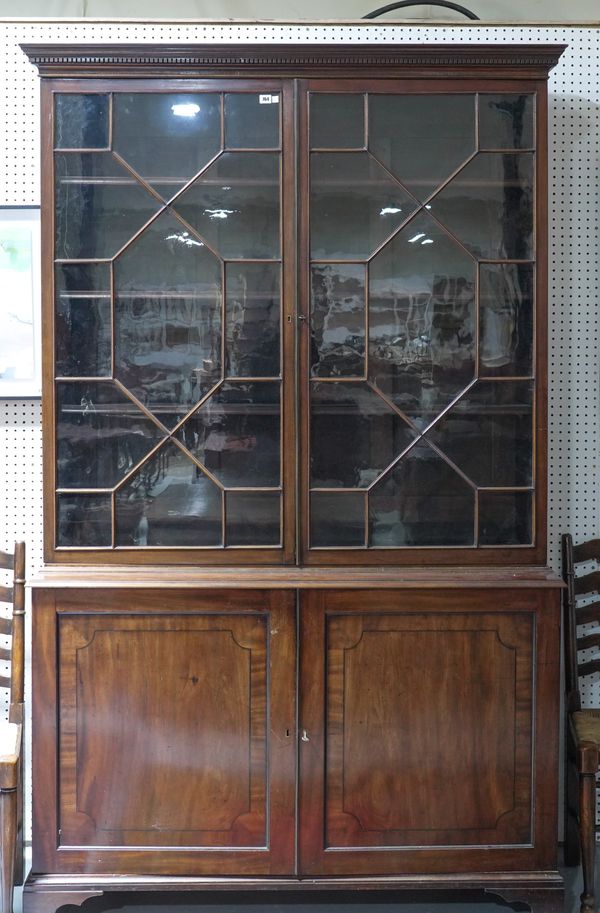 A GEORGE III MAHOGANY BOOKCASE CABINET