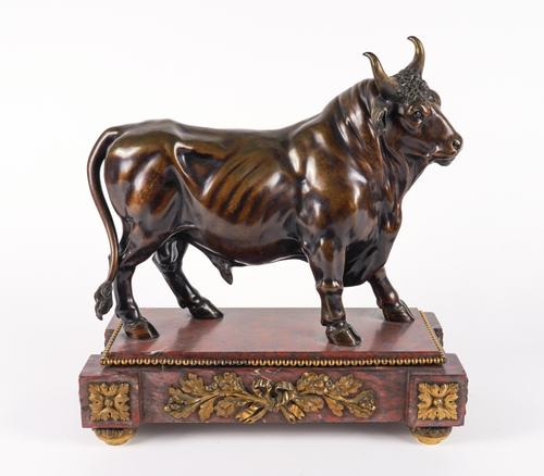 A FRENCH PATINATED BRONZE SCULPTURE OF A STANDING BULL