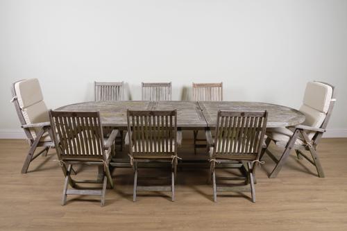PACIFIC TEAK; A TEAK OVAL EXTENDING GARDEN TABLE (9)