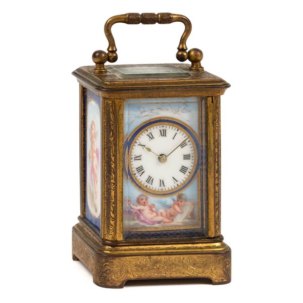 A FRENCH GILT-BRASS AND FOUR PORCELAIN PANEL MINIATURE CARRIAGE TIMEPIECE