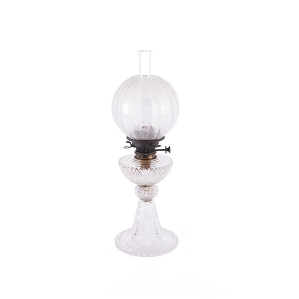 A LATE VICTORIAN CUT GLASS OIL LAMP