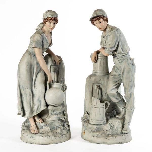 ROYAL DUX; A LARGE PAIR OF FIGURES OF A WATERBOY AND MAIDEN AT A WELL (2)