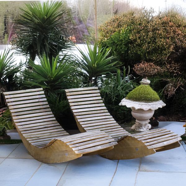 CASARIA; A PAIR OF SLATTED HARDWOOD GARDEN LOUNGERS (2)