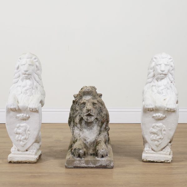 A RECONSTITUTED STONE FIGURE OF A RECUMBENT LION (3)