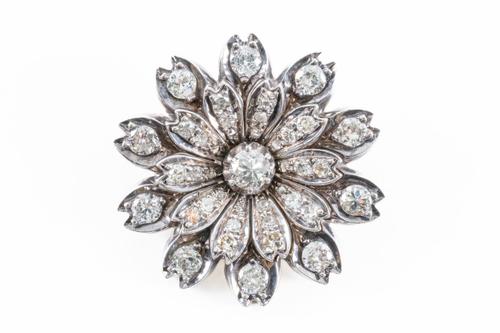 A DIAMOND FLOWER BROOCH