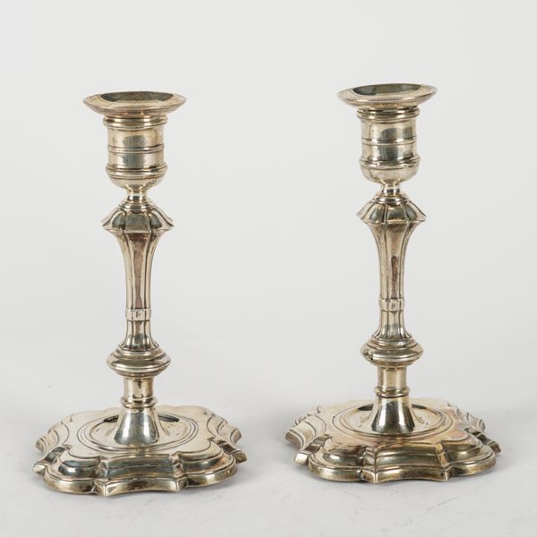 A PAIR OF L;ATE VICTORIAN SILVER TABLE CANDLESTICKS (2)