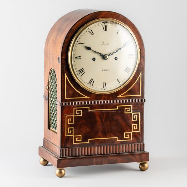 A REGENCY BRASS-INLAID MAHOGANY STRIKING MANTEL CLOCK