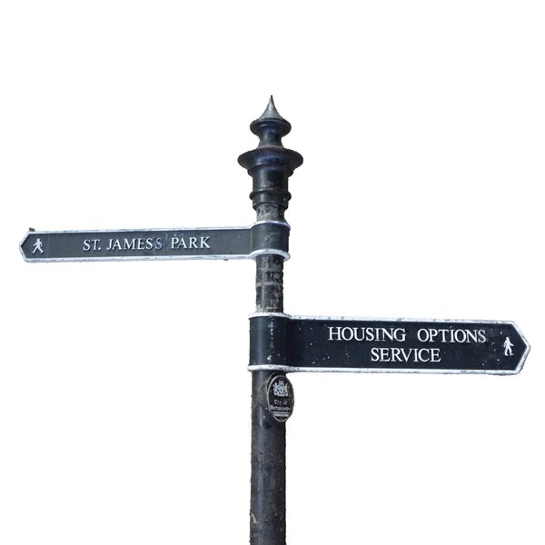 A WESTMINSTER CAST METAL SIGN POST WITH TWO SIGNS