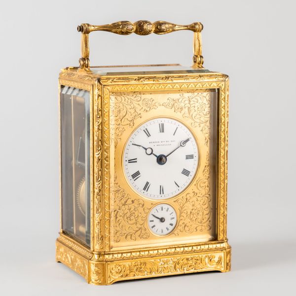 A FRENCH EARLY ONE-PIECE CASE GILT BRASS ENGRAVED STRIKING CARRIAGE CLOCK WITH ALARM