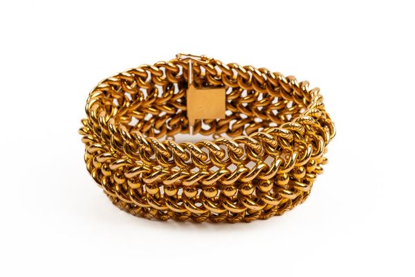 A WIDE GOLD BRACELET