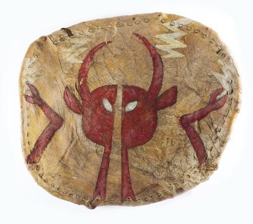 A NATIVE AMERICAN PLAINS INDIANS PAINTED HIDE WARRIOR SHIELD AND ANTELOPE FOOT AMULET (2)