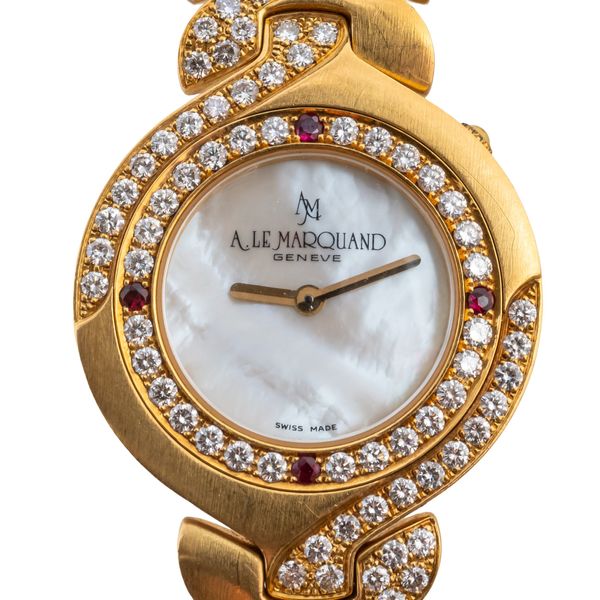A GOLD DIAMOND AND RUBY ANDRE LE MARQUAND WATCH