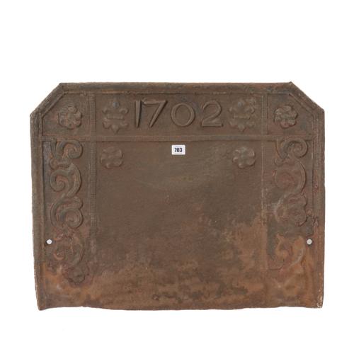 AN ENGLISH QUEEN ANNE CAST IRON FIREBACK DATED ‘1702’