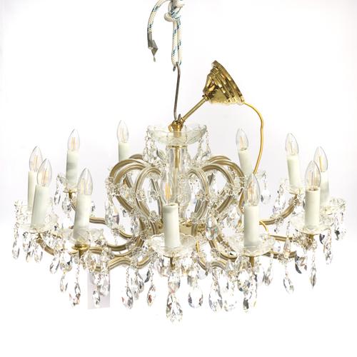 A PAIR OF LACQUERED BRASS AND GLASS TWELVE LIGHT CHANDELIERS (2)