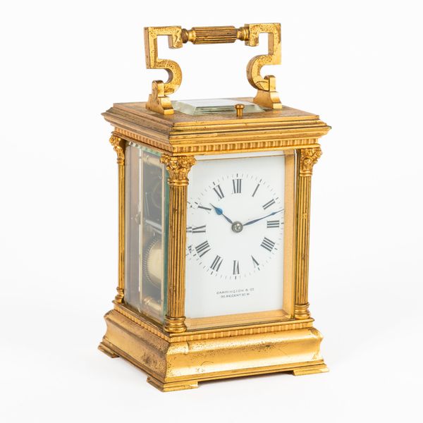 A FRENCH GILT-BRASS STRIKING AND REPEATING CARRIAGE CLOCK