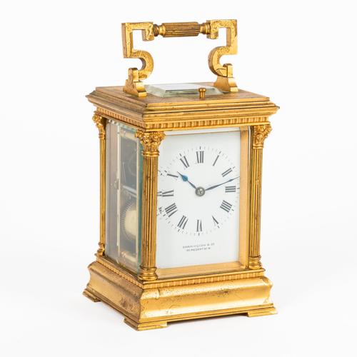 A FRENCH GILT-BRASS STRIKING AND REPEATING CARRIAGE CLOCK