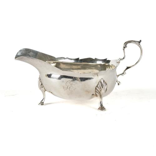 A GEORGE III NEWCASTLE SILVER SAUCEBOAT