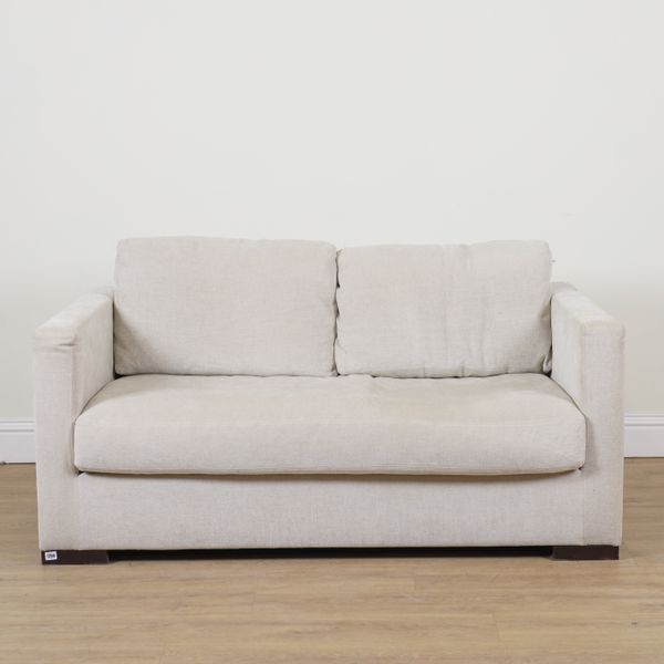 MERIDIANI ITALY; A CREAM UPHOLSTERED SQUARE BACK TWO SEAT SOFA