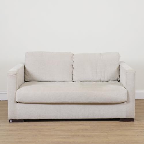 MERIDIANI ITALY; A CREAM UPHOLSTERED SQUARE BACK TWO SEAT SOFA