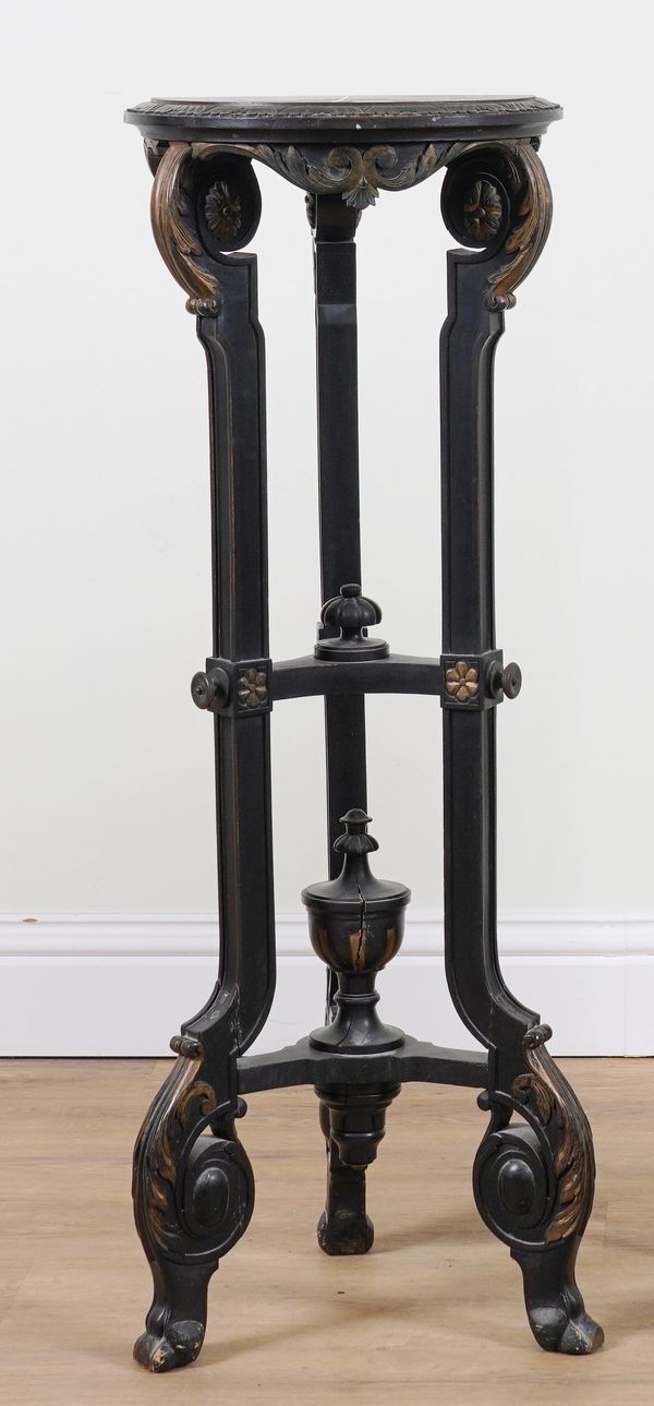 A VICTORIAN EBONISED AND PARCEL GILT DECORATED JARDINIERE STAND