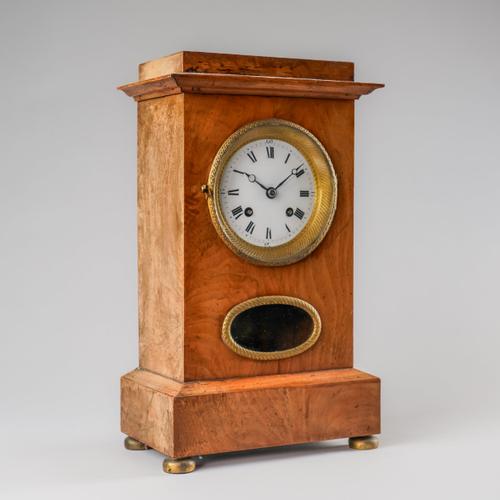 A SWISS FRUITWOOD QUARTER STRIKING MANTEL CLOCK